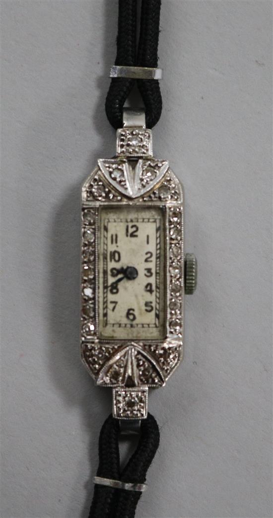 A ladys 1930s/1940s 18ct gold, platinum and diamond set cocktail watch.